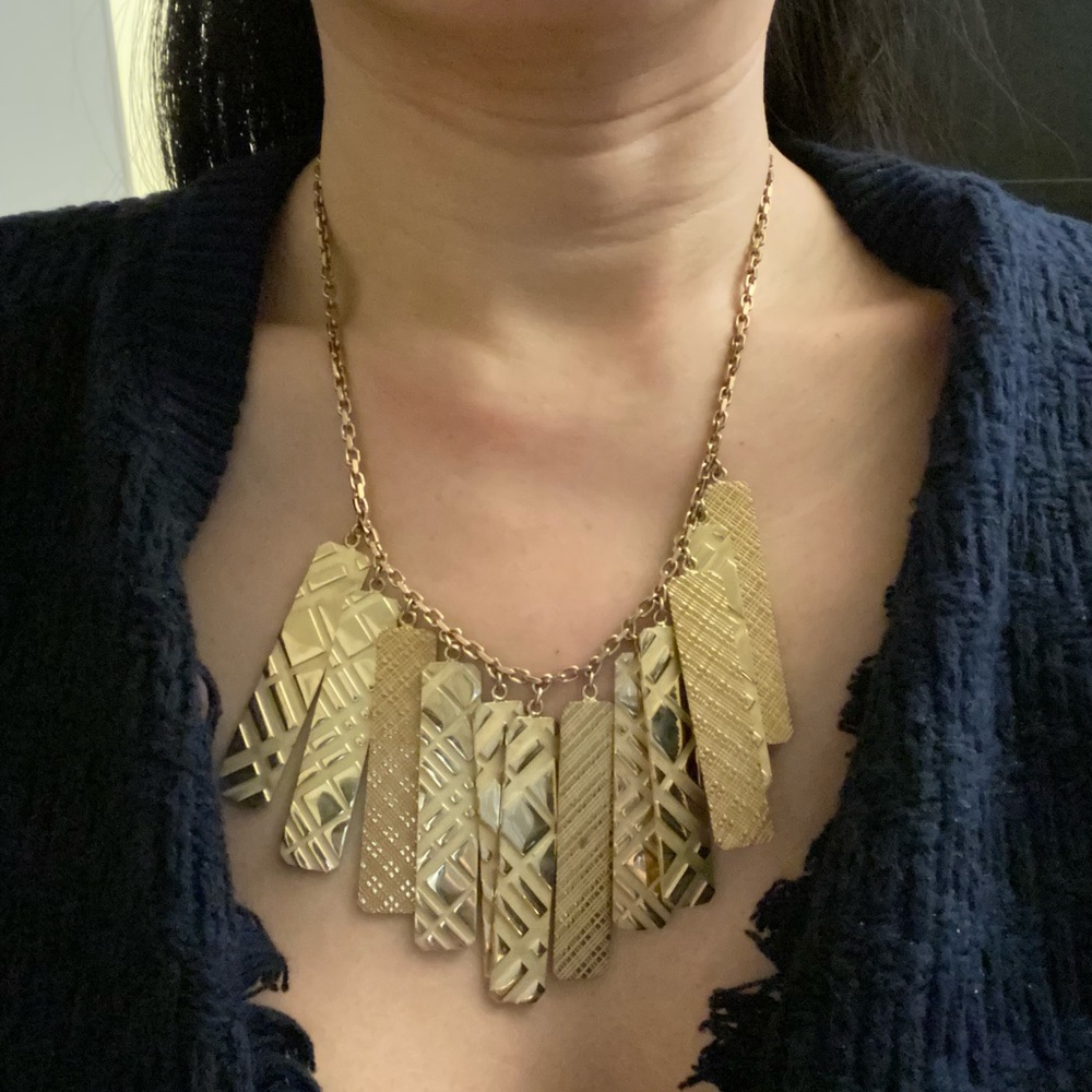 Burberry gold colored necklace